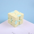 Infinity Cube fidget toy in macaron yellow and light blue for stress relief - Yellow