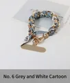 Fashion phone chain with gold metal links and grey-white silk ribbon accessory - 6# Grey White Cartoon