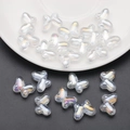 Macro shot of 10x14mm butterfly glass beads with AB iridescent finish for jewelry DIY - AB White