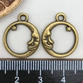 Antique bronze crescent moon and star alloy pendant charms shown with measuring ruler - Antique Bronze Moon and Star Pendant (16x19mm)