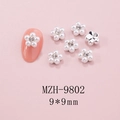 Detail of 9mm five-petal nail charms with central rhinestones and pearl petals - 9mm Faux Pearl Silver Base Flower (9802)