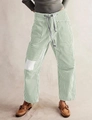 Detail of sage green striped lounge pants with drawstring waist and cargo pockets - S / Green