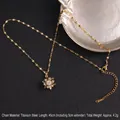 Golden rotating clover necklace with white zircons made of durable titanium steel - Snowflake Zircon Rotating Style (A838)