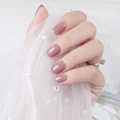 Detailed close-up of glossy dusty rose square-oval short press-on nails on hands - Bean Paste (DFYL-09)