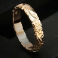 Prachtige 14k gouden ring in Hawaïaanse stijl met handgegraveerde bloempatronen - US 6 / Goud