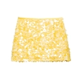Vista piatta di una minigonna gialla di paillettes con grandi dischi tondi scintillanti - XS / Giallo