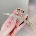 Large gold metal hair claw clip with triple row rhinestones for thick hair styling - Linear Rhinestone