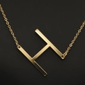 Elegant gold polished letter H pendant necklace with a minimalist fine cable chain - Gold H