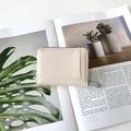 Minimalist beige lychee texture leather accordion card holder with secure zipper - White