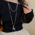 Close-up of double-layer silver alloy horse pendant necklace on a black top - Silver Double-layer Beads Grey Horse Necklace