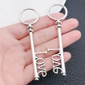 Pair of silver Love key charms with hollowed engraving for DIY jewelry accessories - LOVE Letter Key (3510)
