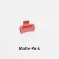 Close-up of a matte pink rectangular hollow hair claw clip with a multi-tooth design - Matte-Pink