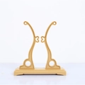 Beige plastic folding fan display stand with ornate vertical support arms on white background - Beige Plastic Round Fan Holder (Style 5)