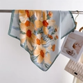 Detailed view of the yellow and blue floral print on the lightweight silk scarf material - 70x70cm / Green (FJ994-3)