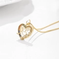 Detailed shot of gold heart MOM pendant with colorful gemstones and micro-paved zircons - Mom Heart Colorful Zirconia Style A