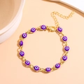 Detail of Turkish purple evil eye bracelet with golden lobster clasp and extender - Purple Gold
