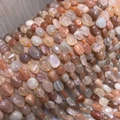 Irregular sunstone gemstone bead necklace with polished natural pink-orange tones - Rainbow Moonstone