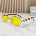 Retro-Oval-Sonnenbrille mit Holzmaserung-Bügeln und gelben Gläsern im goldenen Rahmen - Goldener Rahmen Gelbe Gläser