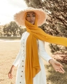 Yellow pearl chiffon hijab paired with a straw sun hat for a summer holiday look - 175*75cm / Ginger Yellow