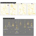 Detailed view of 4-piece set of gold Christmas window stickers with festive snowflakes - Gold Hanging Ball BQ150