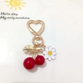 Golden heart-shaped metal keychain with red cherry and white daisy charms - Red Cherry with White Daisy and Heart Buckle (Cherry H)