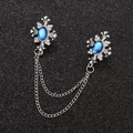 Detail of vintage silver collar chain with blue gemstones and double metal tassels - White K Sapphire Blue (10 N-154)