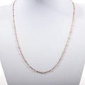 Detail of gold-plated stainless steel chain with pink enamel beads for women - Gold + Pink