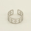 Anillo ajustable de acero inoxidable plateado con diseño de cruz calada estilo minimalista - Talla 7 (Ajustable) / Color Acero