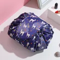 Dark blue drawstring makeup bag with alpaca print and white-orange floral patterns - Alpaca