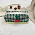 Close-up of green checkered pouch featuring handmade crochet cherries and sturdy canvas texture - Makeup Box / Green