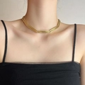 Elegant gold double-layered cylindrical link necklace worn on model's neck - Gold-Tone Double-Layer Cylindrical Link Necklace (Style 4)