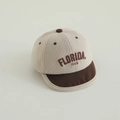 Baby-Cordcap in Beige und Braun mit Florida 1845 Bestickung für Kleinkinder - FLOR Buchstaben / Gebrochenes Weiß