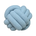 Handmade knotted ball pillow in blue lamb wool fabric with plush texture on white background - Sky Blue