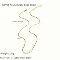 Detail of 316L stainless steel gold snake chain necklace with beads and lobster clasp - Gold Round Snake Bead Chain