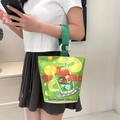 Green canvas bucket handbag featuring soda and cat illustrations with wooden ring handles - Soda Summer Lemon