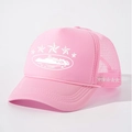 Rosa Trucker Cap mit weißem Stern-Stick und atmungsaktiven Mesh-Einsätzen hinten - Rosa
