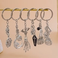 Set of 6 silver Halloween keychains featuring spider web skull and pumpkin charms - Halloween Metal Pendant 6Pcs Set