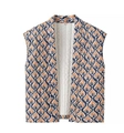 Dettaglio gilet vintage con collo alto, motivo geometrico e fodera trapuntata bianca - S / Floreale Scuro