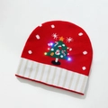 Festive red knitted beanie with LED Christmas tree lights on a clean white background - Red Christmas Tree