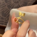 French style gold butterfly ring for women with delicate textures and heart details - Golden Butterfly Ring