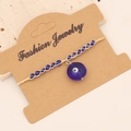 Boheems geweven kralenarmband met blauwe evil eye bedel op een presentatiekaart - Hart Evil Eye Hanger (2#)