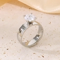 Polished silver titanium steel ring featuring a brilliant round zircon in a 4-prong setting - 6mm Silver Smooth Style (KR100653-K)