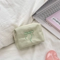 Detail of light green canvas makeup bag with exquisite green bow embroidery on fabric - Green