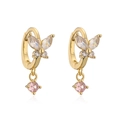 Gold butterfly earrings with colorful zircons and pink dangling stone on white backdrop - Gold Pink Zirconia