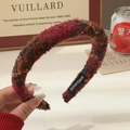 Handmade woven headband in reddish-brown yarn with high-top design and handmade label - Rose Red Hand-knitted