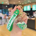 Green astronaut liquid floating keychain with Good Luck strap and golden keyring - Green Quicksand Series-Coke Bottle