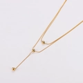 Elegant gold double-layer snake chain necklace with delicate polished round beads - Gold
