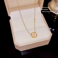 Golden titanium steel necklace with white clover pendant and zircon in a pink box - X675 Four-leaf Clover Shell