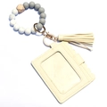 Detail of silicone bead wristlet with marble texture, fringe tassel and PU leather card holder - Off White