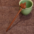 Detailed carving of a lucky pig on a premium sandalwood hair stick for elegant styling - Heart Pig (Zebrawood)